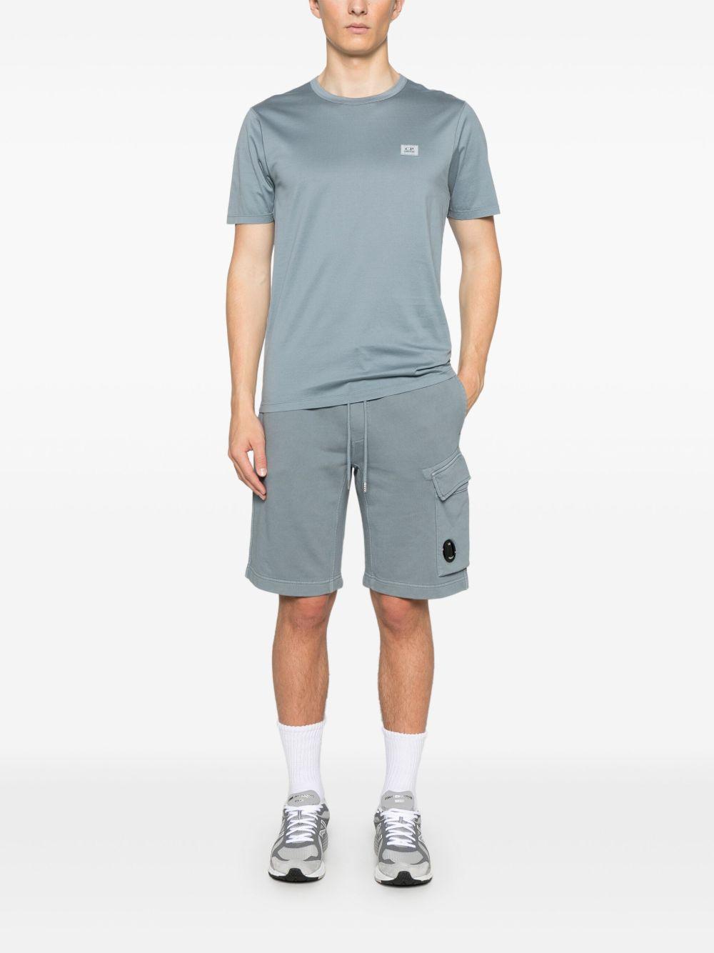 Camiseta C.P. Company Mercerized Jersey Logo Patch 18CMTS087A006374G 872 C.P. COMPANY